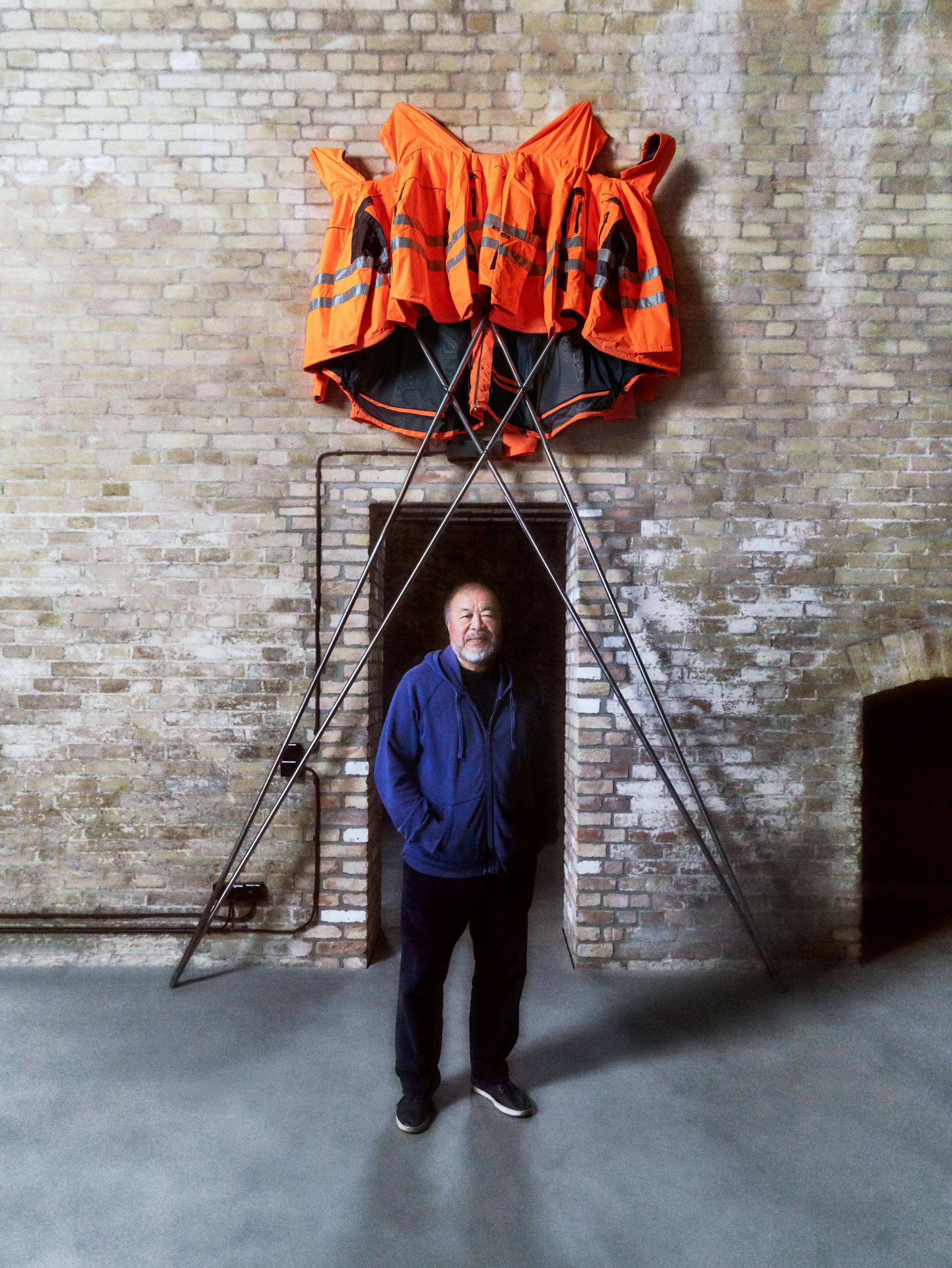 The artist Ai Weiwei and the work „Safety Jackets Zipped the Other Way”.
